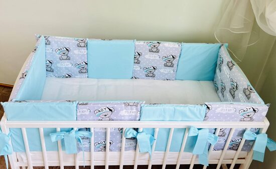 Praktiskās apmalītes gultiņai “It’s a boy”