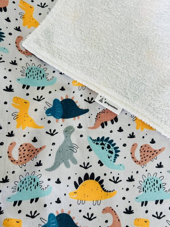 Mitrumnecaurlaidīgs aprūpes paladziņš "Dinozauri uz pelēkā fona"